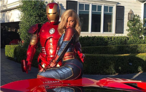Kylie Jenner and Travis Scott posed as Avengers to the Red Ferrari